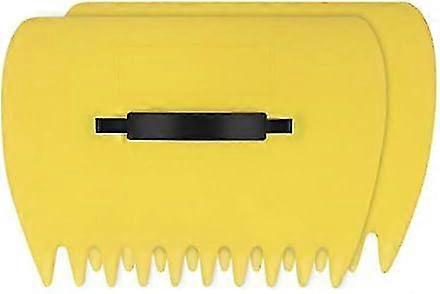 Paar gele plastic bladschoppen, bladschep, handhark