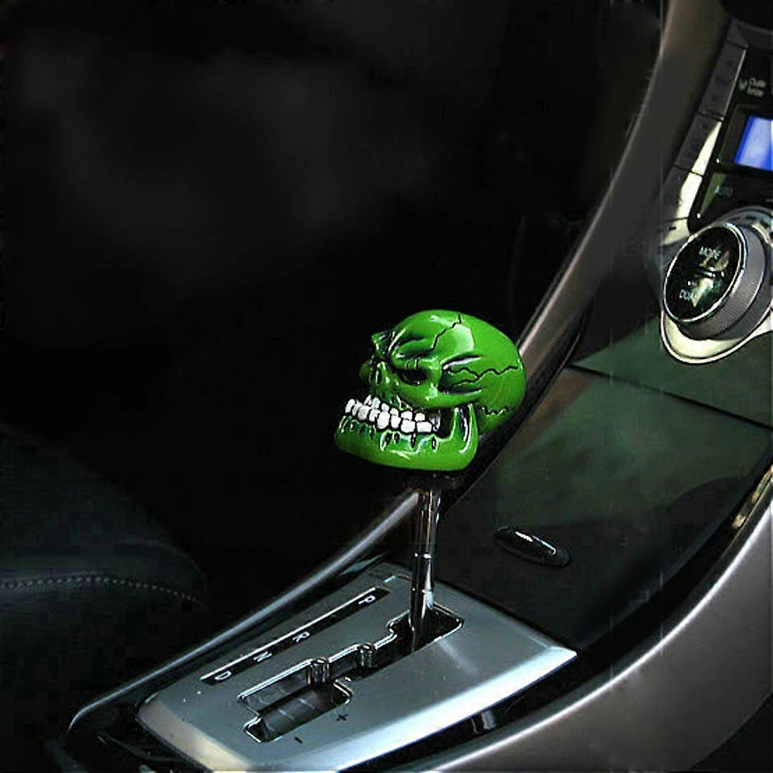 Pomello del cambio manuale o automatico in ABS a forma di testa di teschio universale con tre coperture in gomma adatto a tutte le auto