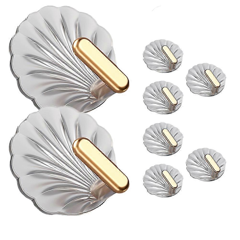 Great! Here's a polished product description you can use for the 8pcs Self Adhesive Wall Hooks:

 

**8pcs Self Adhesive Wall Hooks – Transparent