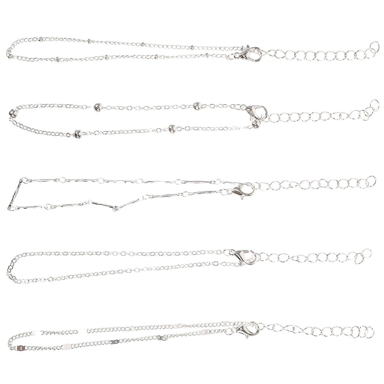 Here's a polished and engaging product description you can use for your **5pcs Silver Beaded Anklet Set**:
✨ **5 Piece Silver Beaded Anklet Set