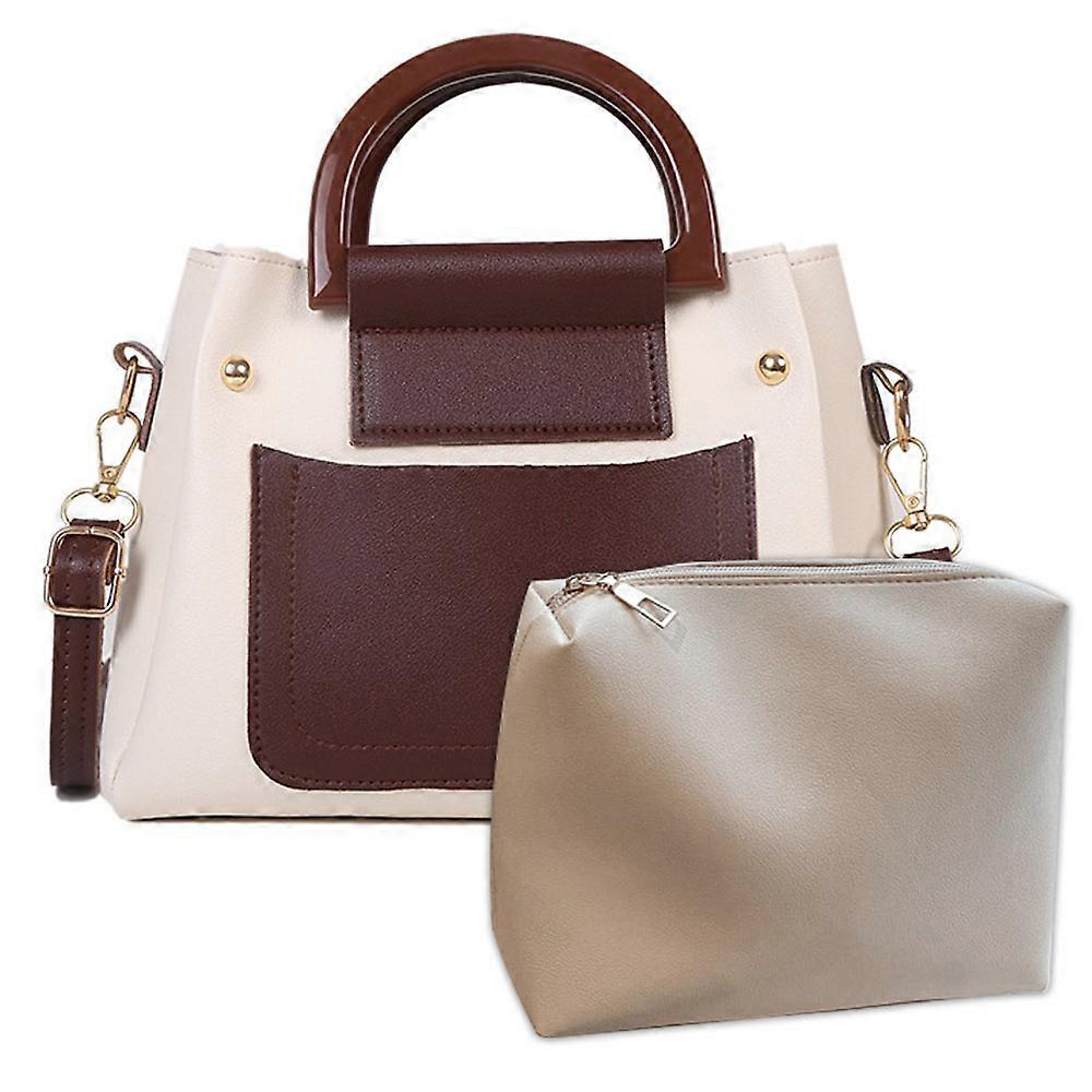 Large-capacity artificial leather handbag suitable for daily commuting.