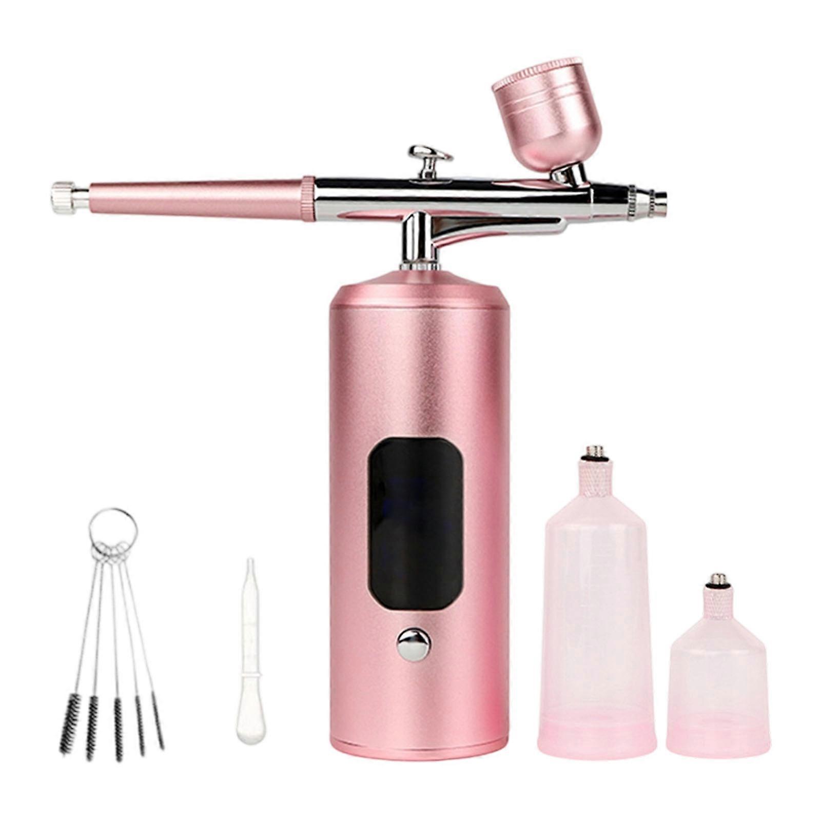 Advanced High Efficiency 7.4V Handheld Air Sprayer Tool Multi Use Design For Deep Moisturizing Cosmetic Detailed Artwork pink color
