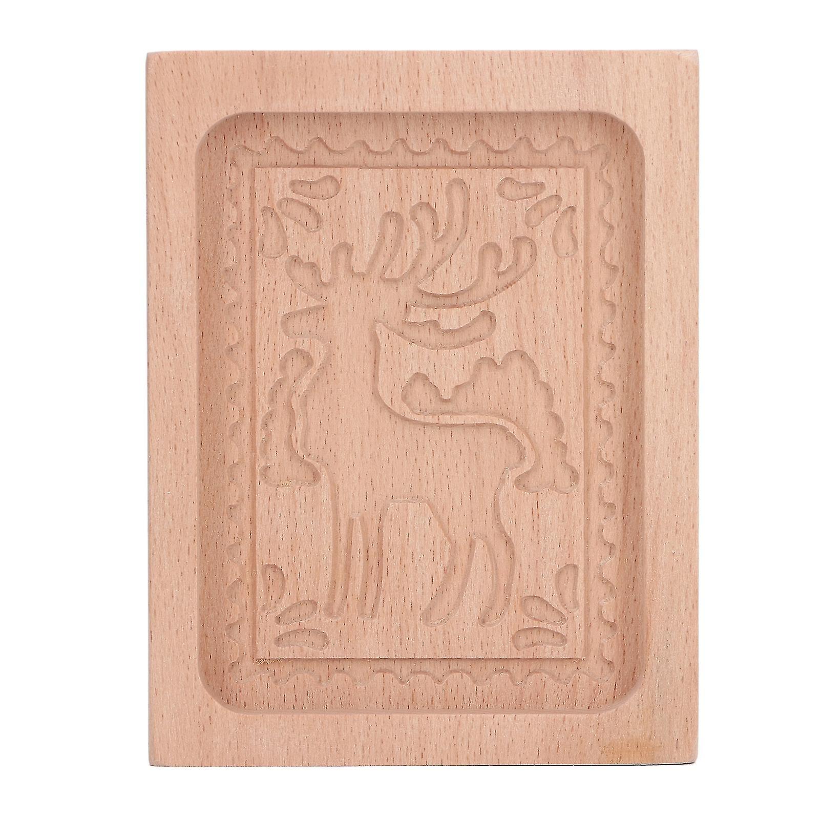 Geschnitzte Ausstechform aus Holz, Elchform