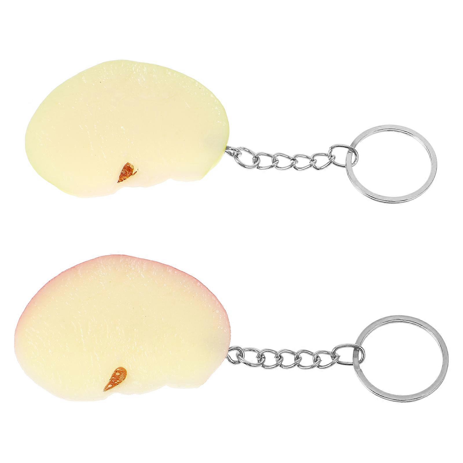 Here's a refined and professional product description for your item:
**2pcs Realistic Pendant Charms Soft Keychain Ornaments for Bag & Luggage
