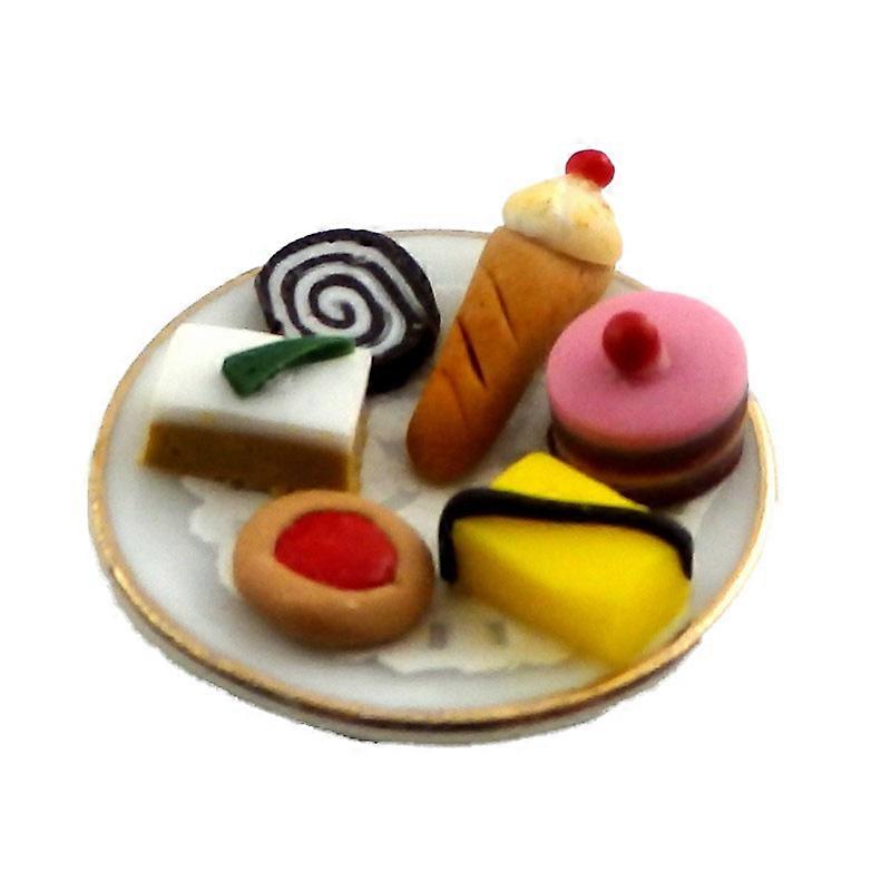 دمى البيت لوحة من يتوهم الكعك كريم الطازج مصغرة الشاي بعد الظهر