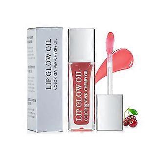 Aceite labial voluminizador color naranja coral con hidratación profunda y brillo no pegajoso para unos labios más voluminosos.