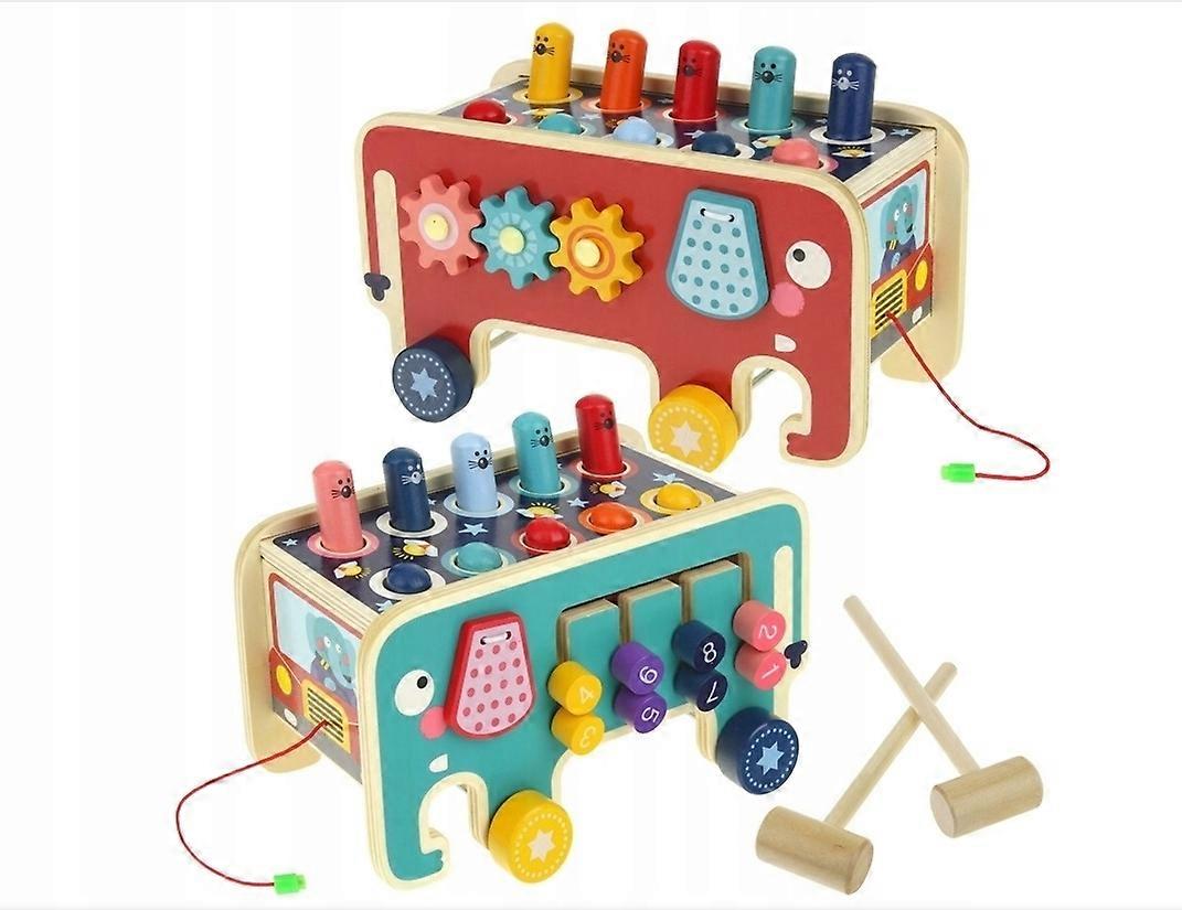 Puller Elephant. Wooden Pestle. Hammer