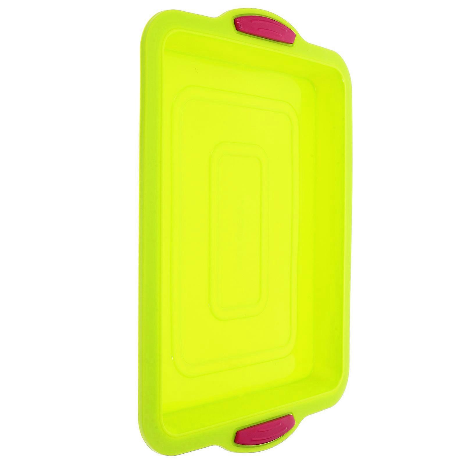 Grüne Silikon-Backform mit Griff