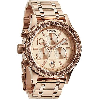 Nixon 38/20 Quartz Analog Unisex Watch with A404897 Gold Plated Stainless Steel Bracelet