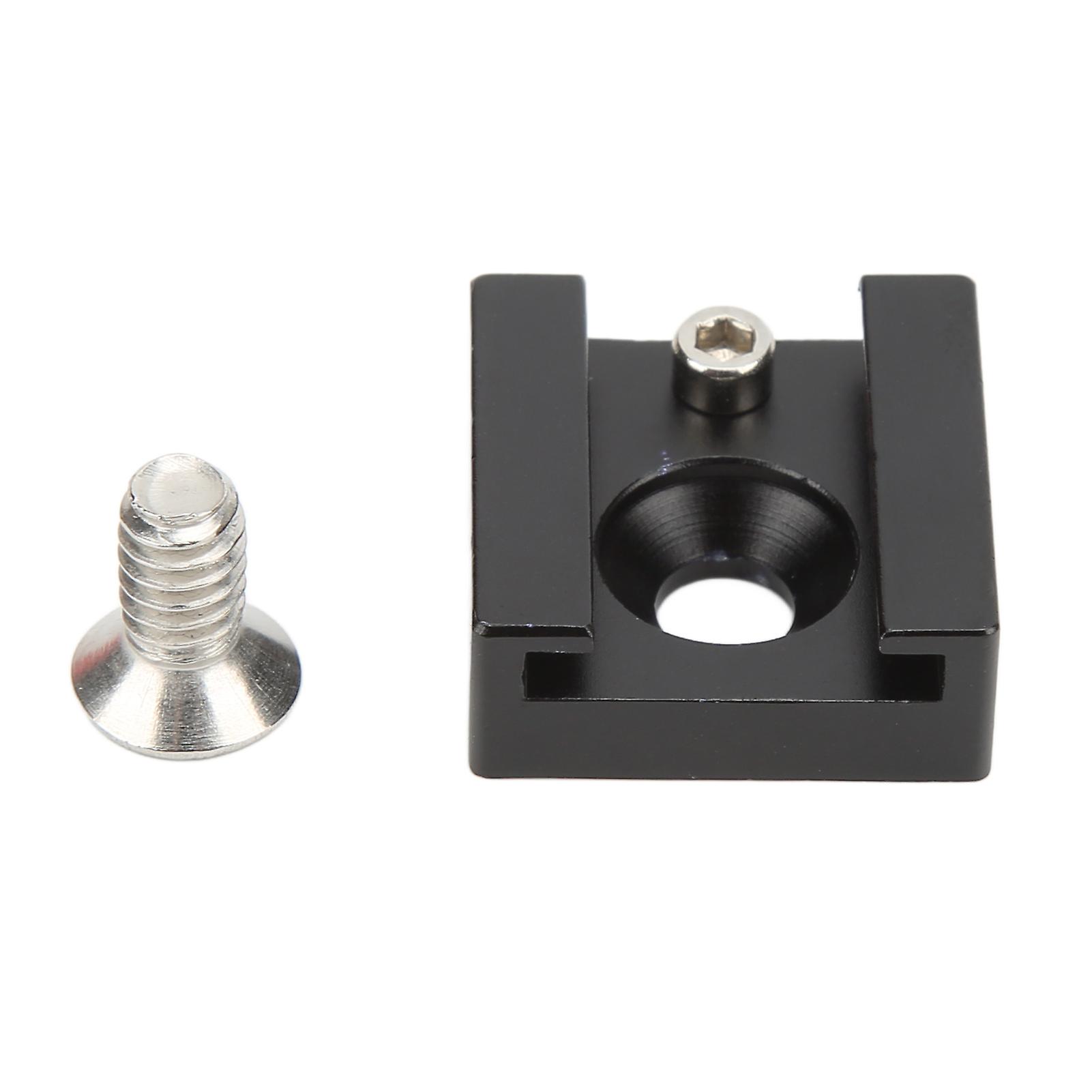 Cold shoe mount with 1/4in screw for camera cage flash monitor microphone.