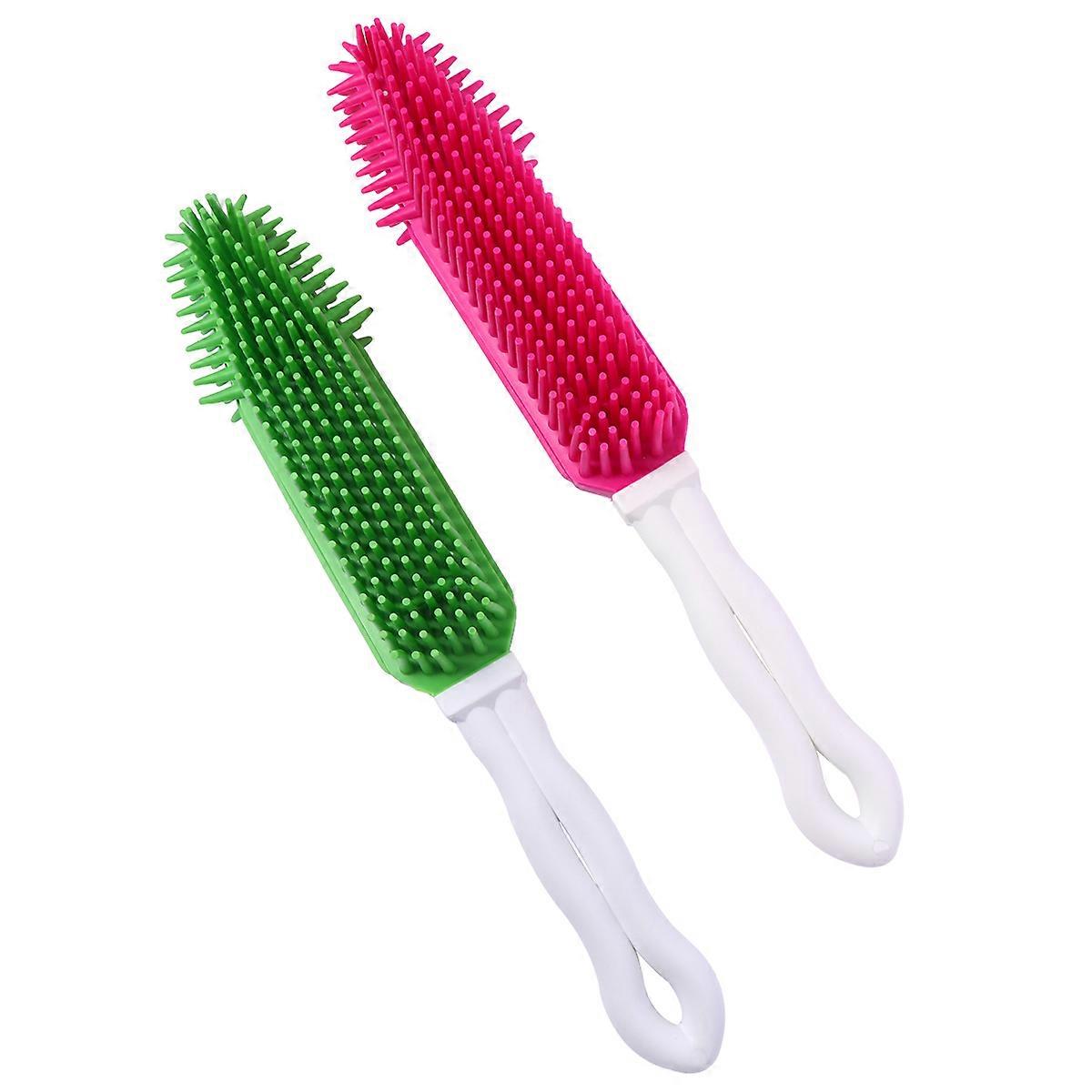 إليك وصف مصقول واحترافي للمنتج بناء على التفاصيل التي قدمتها:

** 2 قطعة من السيليكون المجوف المشط للحيوانات الأليفة للكلاب و