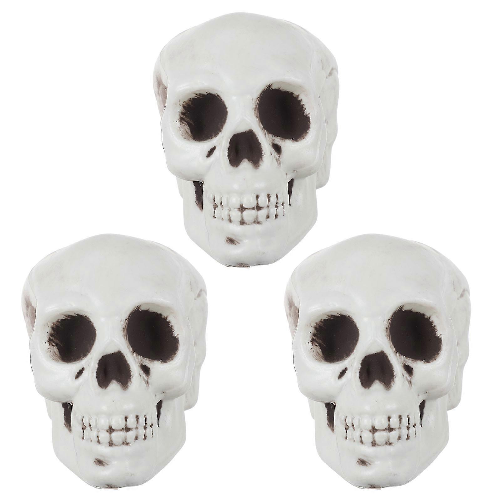 Here's a refined and engaging product description based on your input:

   

**3pcs Skull Shaped Decor – Realistic Halloween Ornaments for Home,