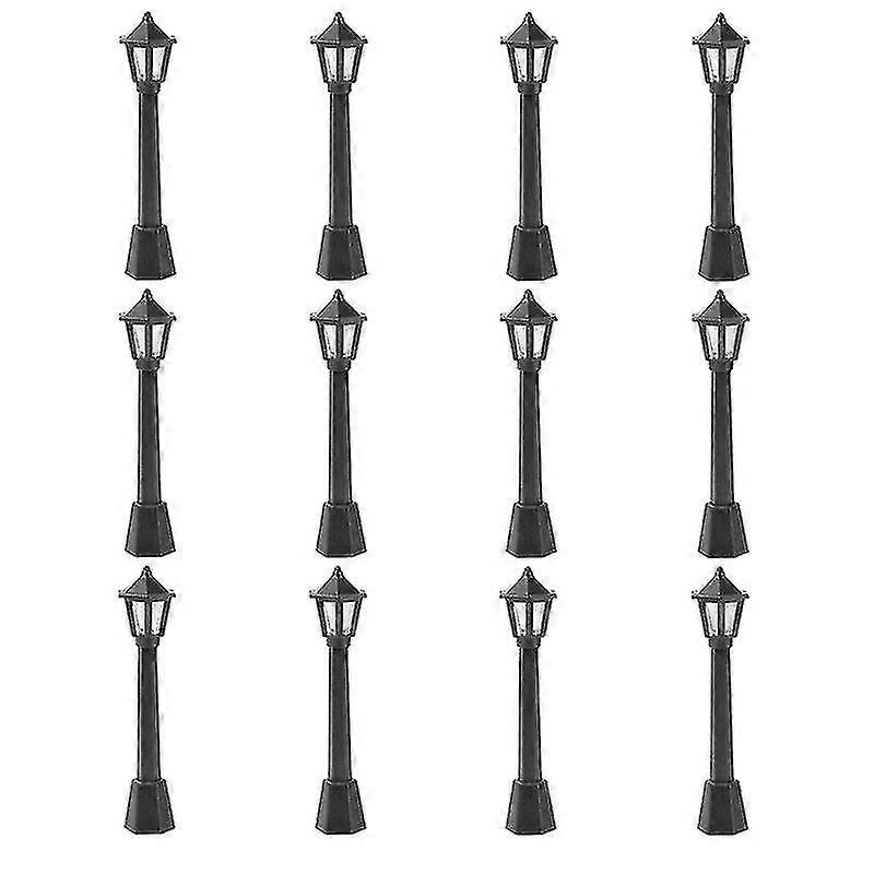 12 stycken minileksaker för barn (svarta)