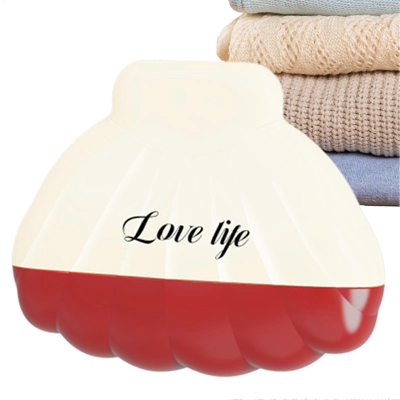 Shellshaped lint rollers, washable and reusable, for creamy clothing.