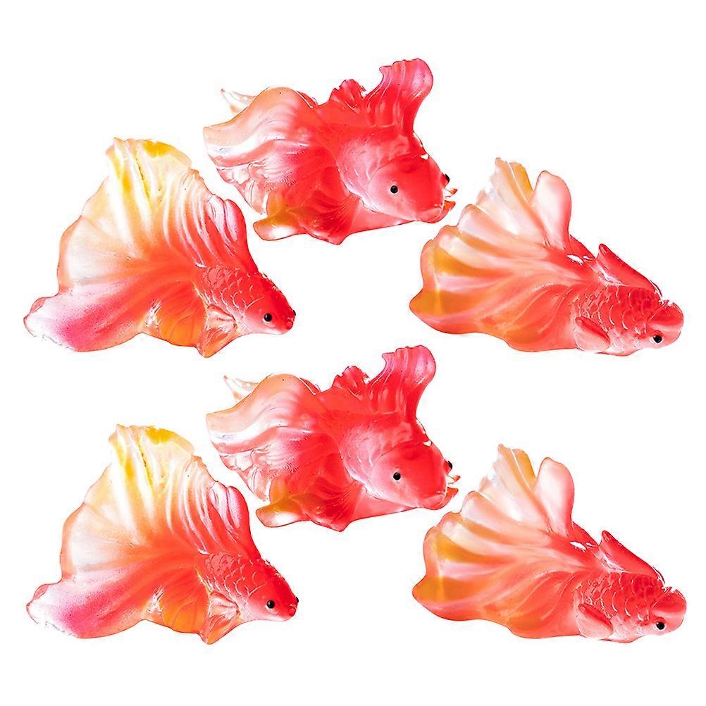 Here's a refined and engaging product description based on your input:
**6pcs Miniature Goldfish Figurines Realistic Resin Statues for Garden &