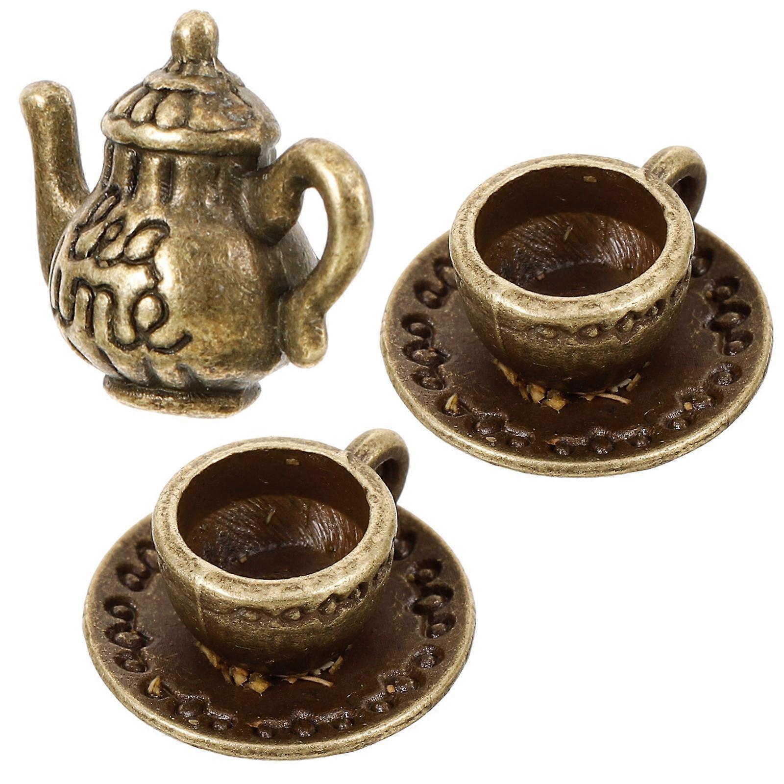 Here's a polished and engaging product description based on your input:
**Miniature Tea Set – Teapot & Cups for Dollhouse & Micro Landscape