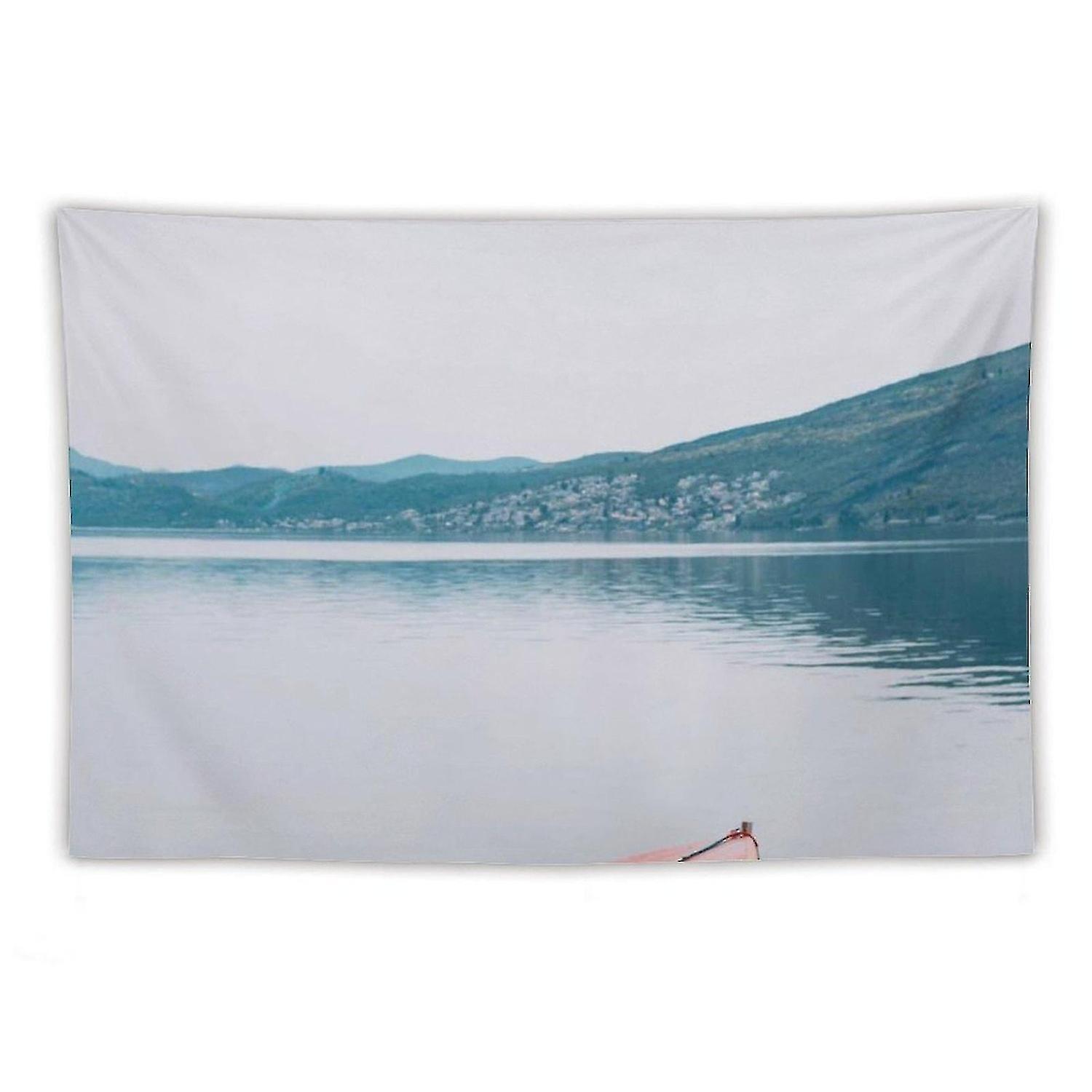 Boat moored on tranquil lake on Kolam print art tapestry