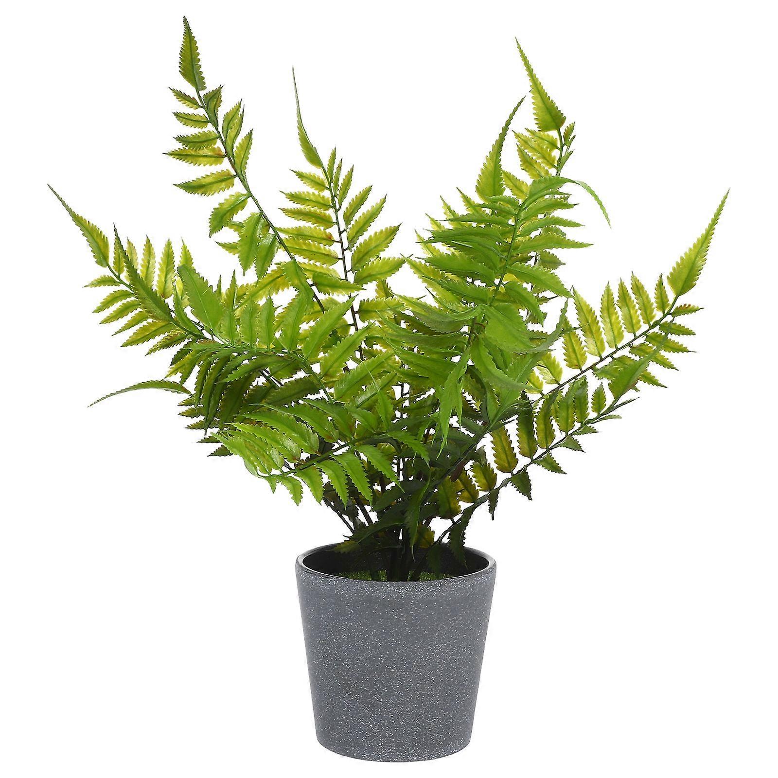 It seems like you're referring to a product listing or description for an artificial fern plant, possibly from an online like , , or similar. You