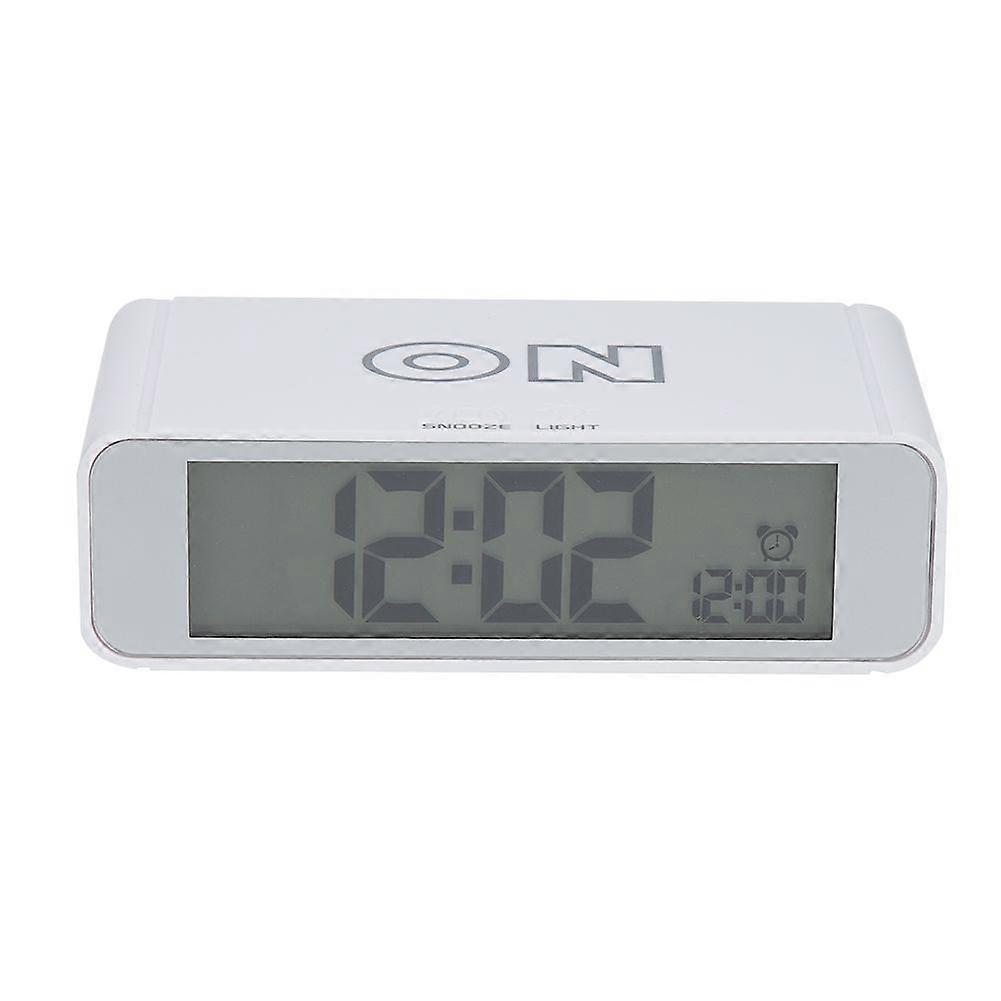 Digital alarm clock with LCD display and smart light control function