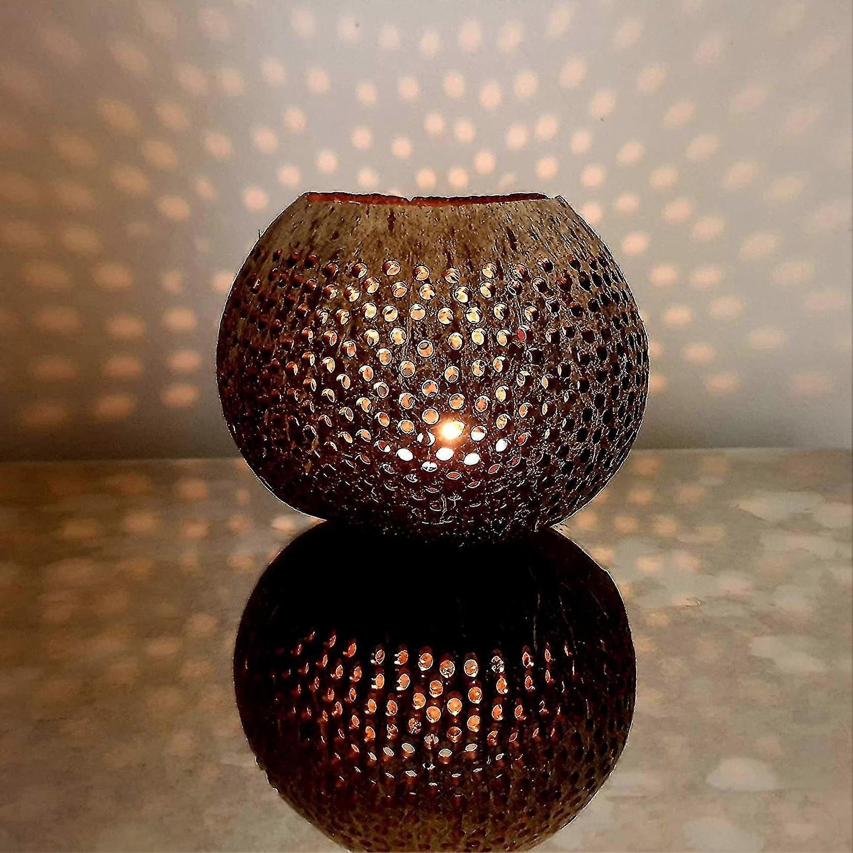 Coconut shell bowls, Hand - crafted with unique perforated and patterned designs, Perfect for decorative or serving purposes