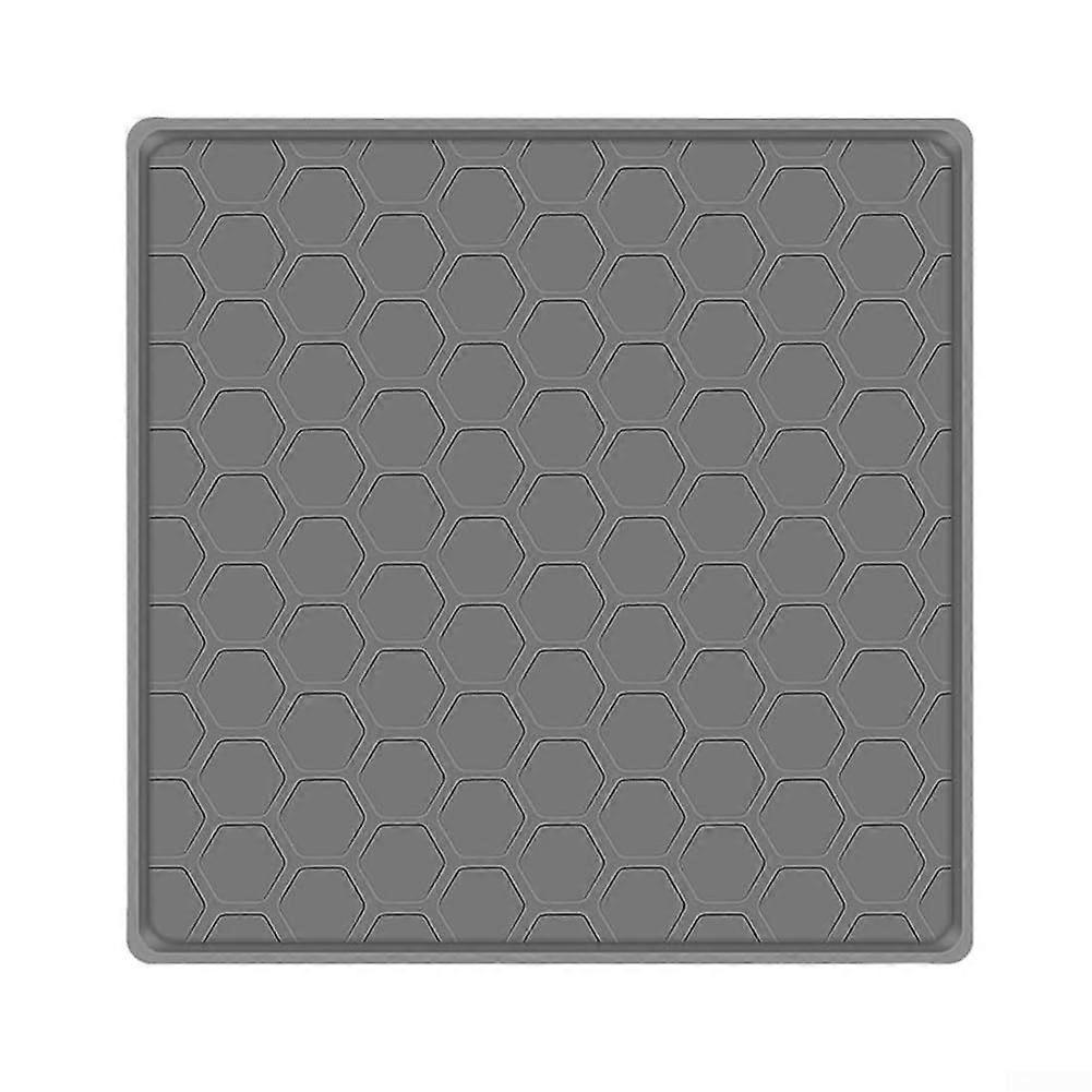 Slim design silicone pad that combines style with functionality in the kitchen while protecting your floors (gray).