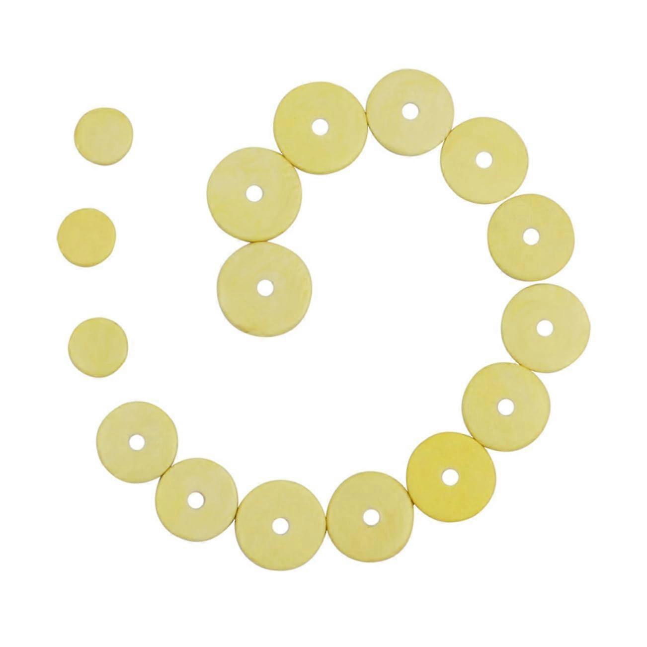 Replacement pads for woodwind instruments, flute pads in light yellow for precise , available in various diameters for fit and sealing.