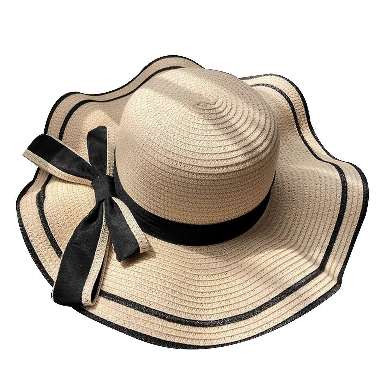 Bow-decorated wide-brimmed straw hat for summer beach