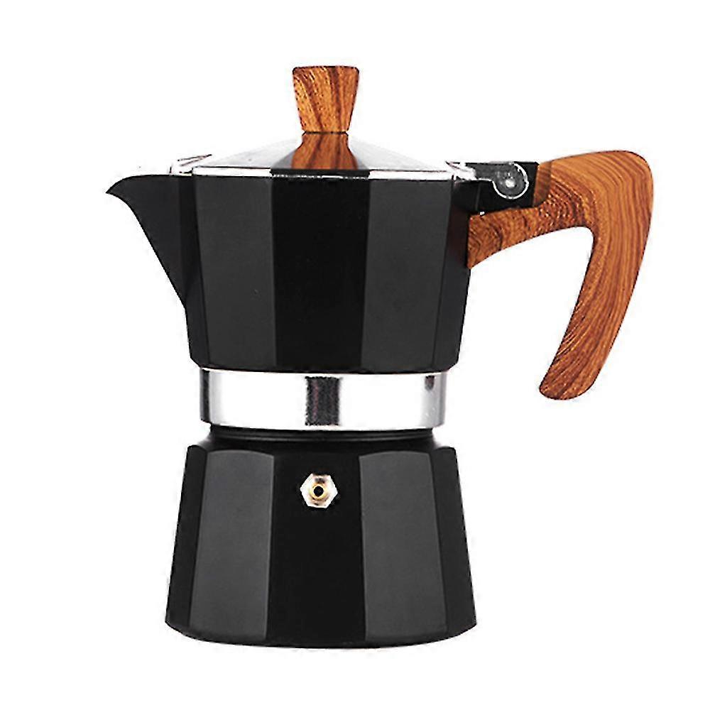 Macchina per caffè espresso classica con piano cottura per un ottimo espresso forte aromatizzato, una pentola di moka per caffè espresso alluminoso in stile italiano, una caffettiera cubana e greca, un caffè moka