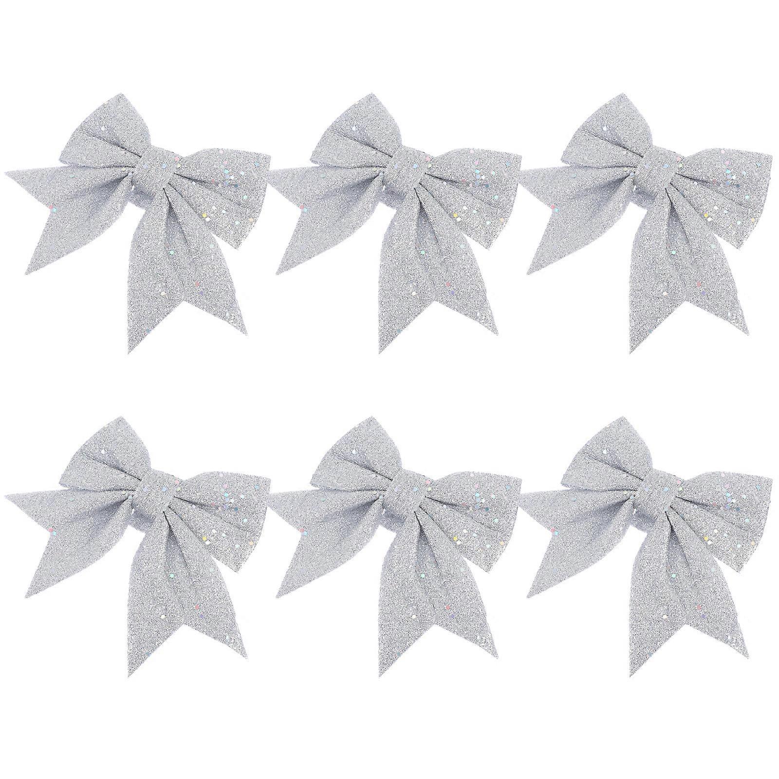 a refined product description you can use for the given item:
**6pcs Silver Sequin Bow Christmas Tree Hanging Ornaments – Lightweight Xmas