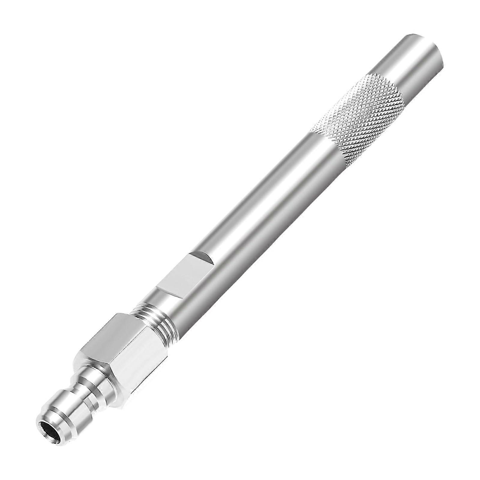 Nozzle for pressure interruption, nozzle tip area, stainless steel texture, suitable for efficient cleaning.