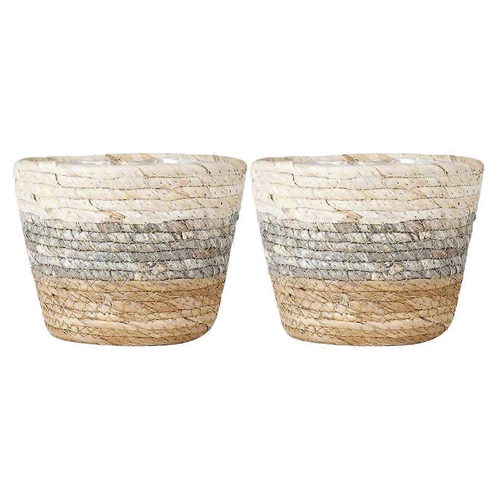 Here's a polished and engaging product description based on the title you provided:
 
**2pcs Decorative Flower Baskets – Woven Planter Containers