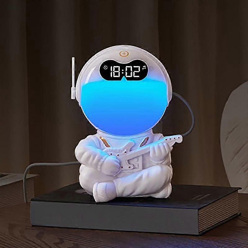Alarm clock with sunrise simulation and Bluetooth speaker for children