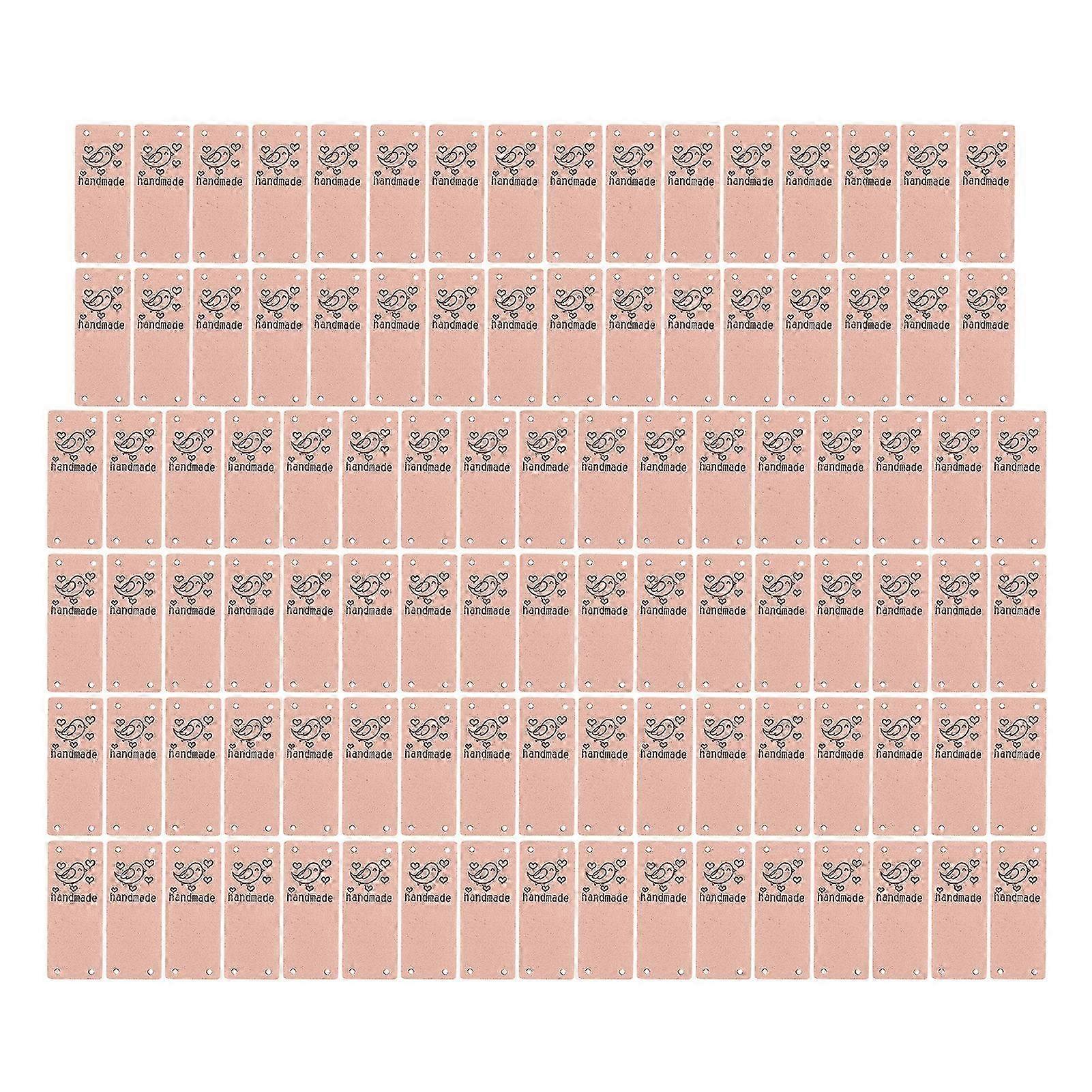 100 יחידות תווית עור PU צבע ציפור בעבודת יד רך 4 חורים אביזרי DIY שימושיים לכובע ארנק (ורוד)