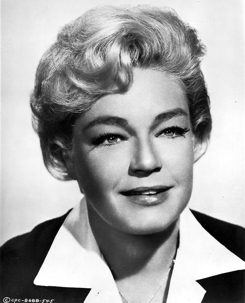 Simone Signorette wearing a Black Coat Poster