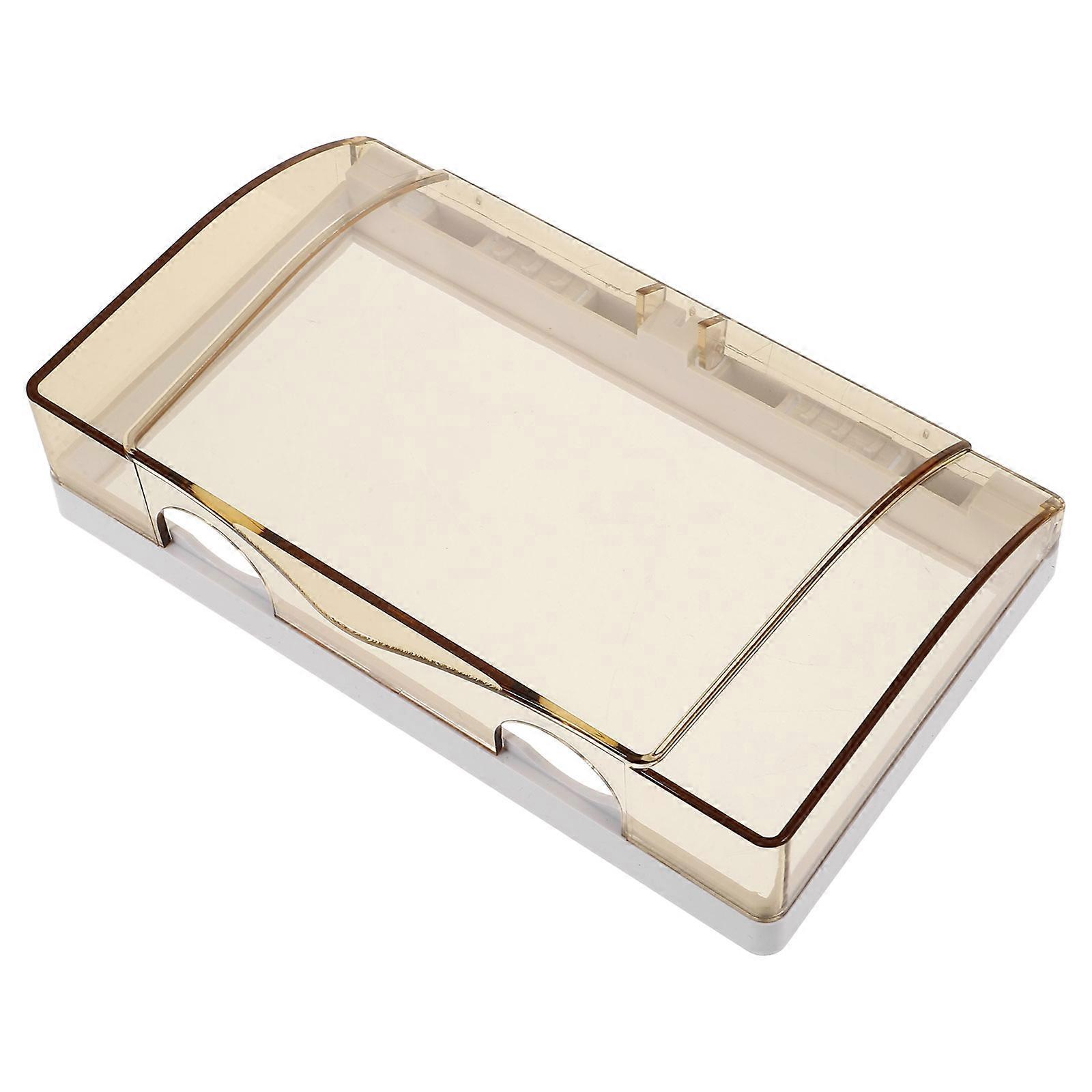 Cache-prise en plastique avec adhésif intégré