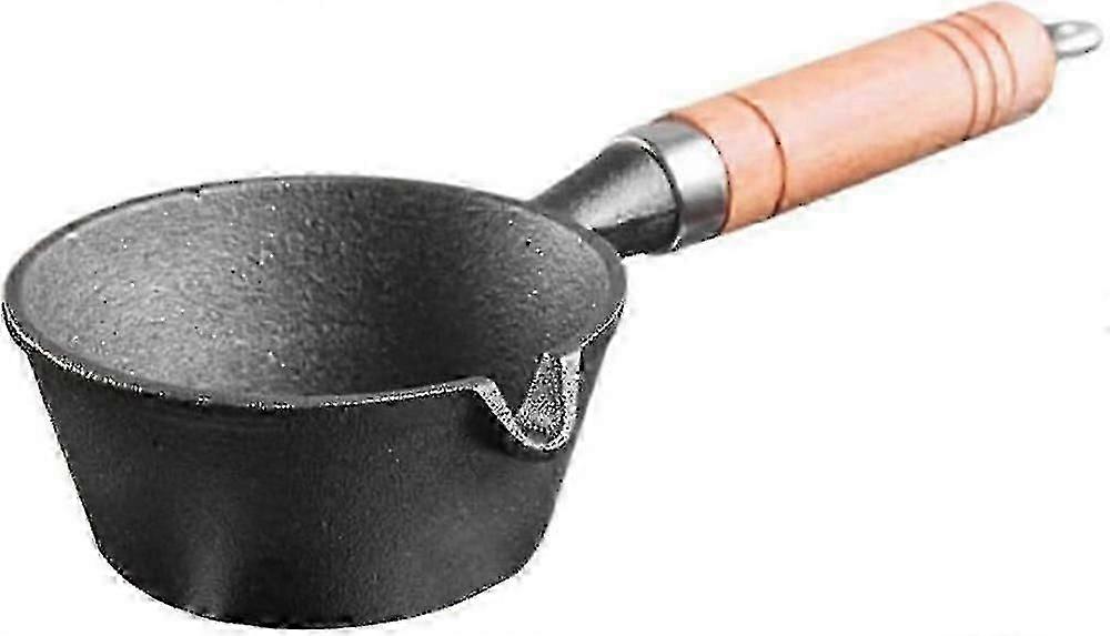 Baking pan for cheese with wood handle and cast iron construction