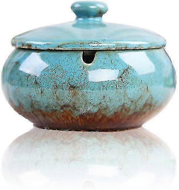 Lidded ashtray for smokers with windproof ceramic design