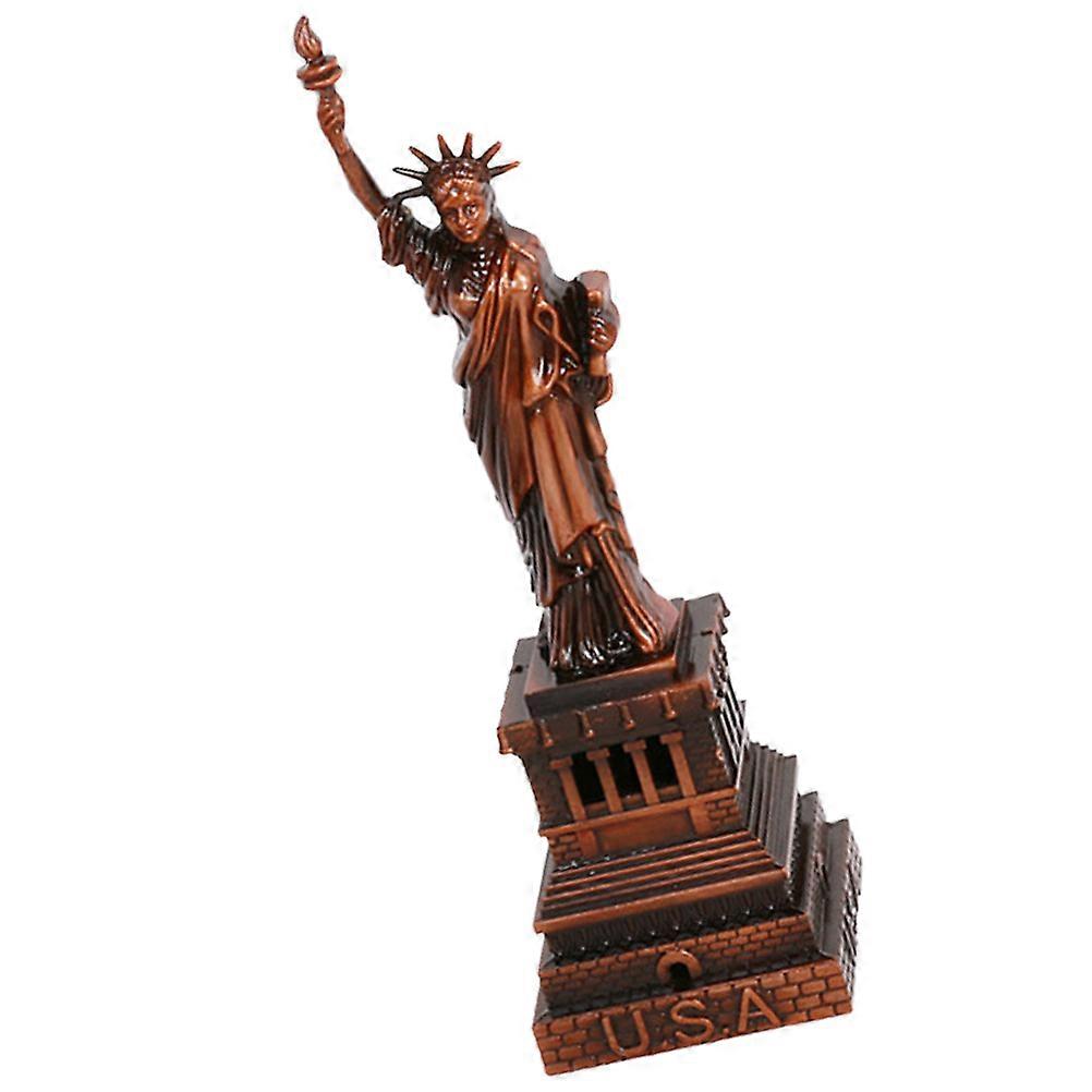 It seems you're referring to a **metal Statue of Liberty figurine** used as a decorative item for home, office, or garden spaces. These types of