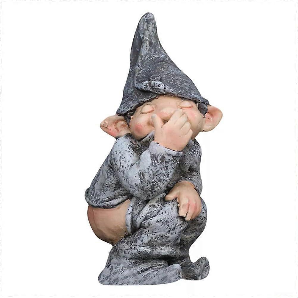 Funny decorative piece with a cheeky sitting dwarf in a pooping pose, equally suitable for gardens and houses.