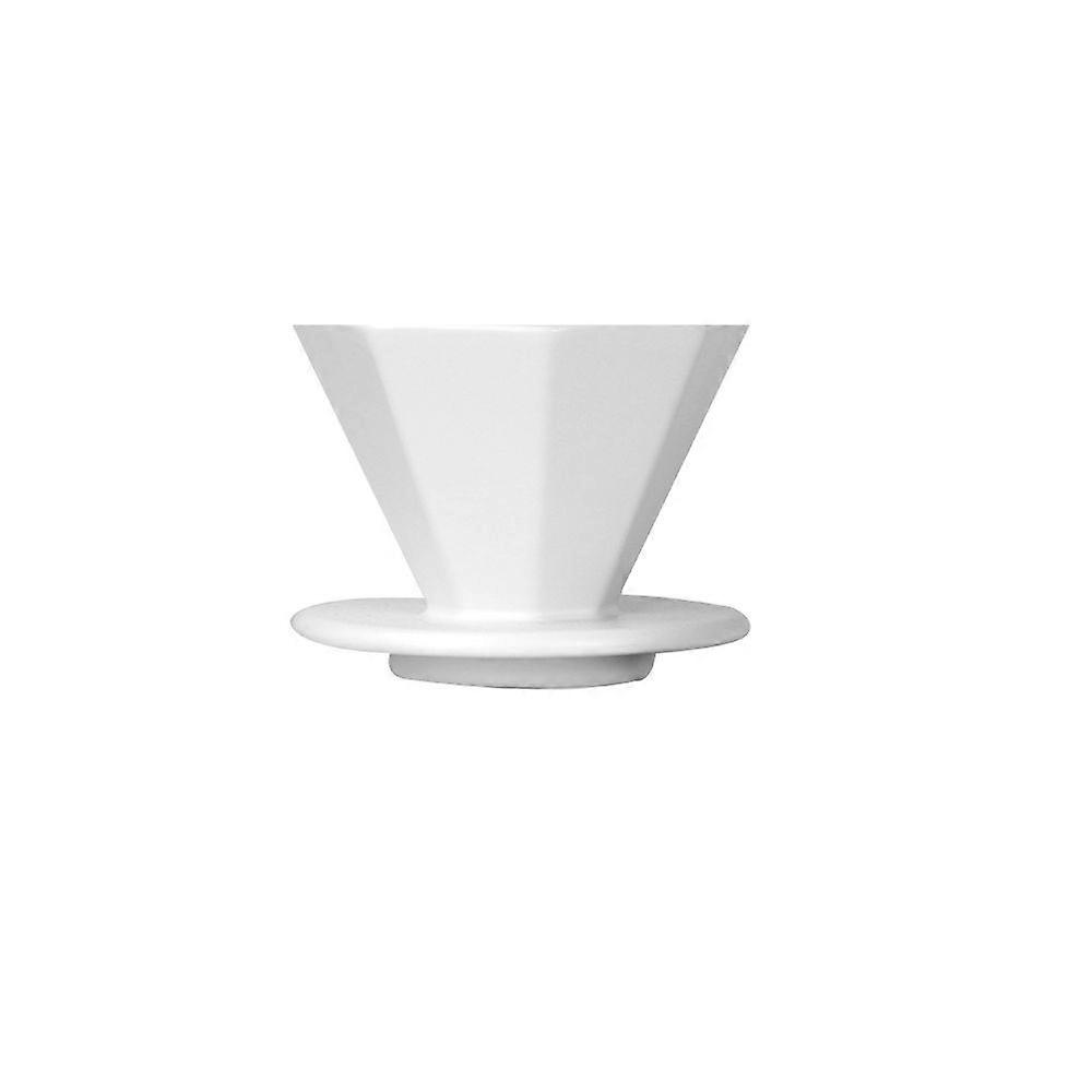 A large octagonal white ceramic filter cup