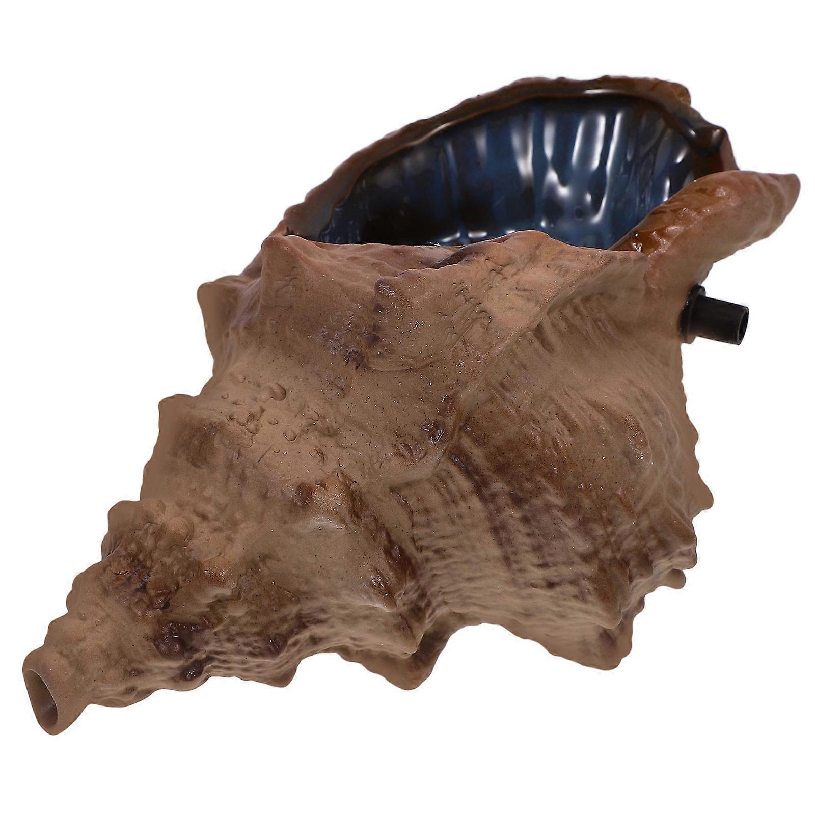 The **Ceramic Conch Water Fountain Ornament** is a charming and functional decorative piece designed for use in both **aquariums and gardens**.