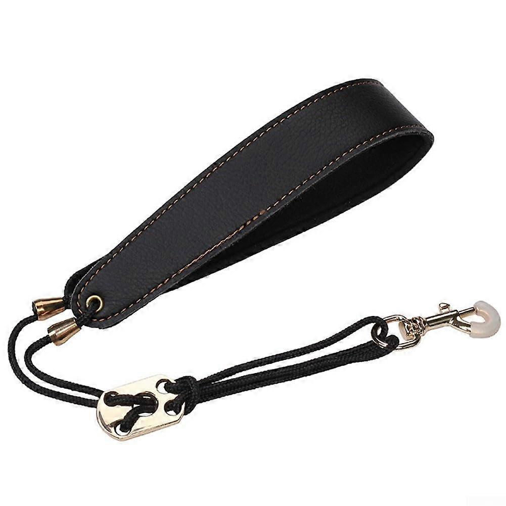 Black saxophone neck strap, designed to relieve pressure and provide playing comfort.
