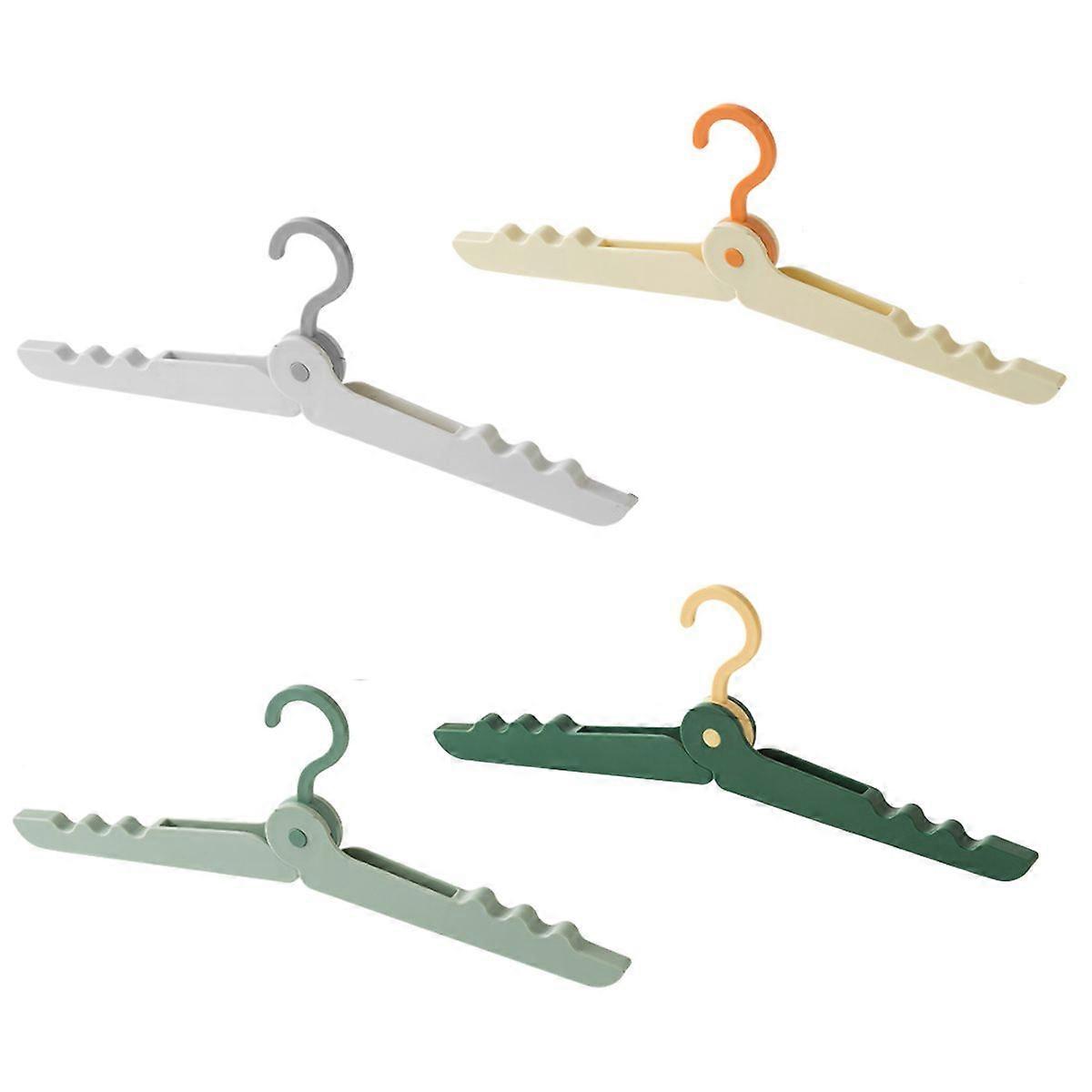 4 Foldable Travel Hangers with Clips for Clothes and Socks.