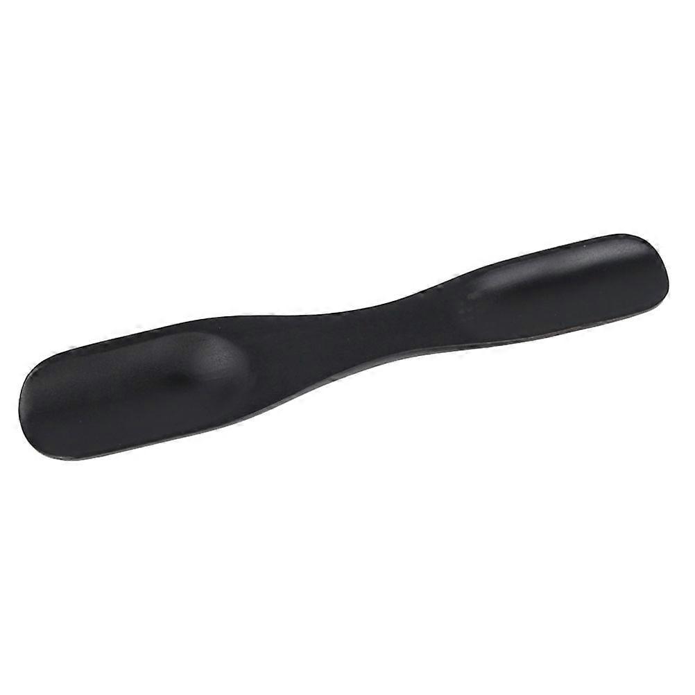 The **Long Wooden Shoehorn with Double End Design** is a practical and durable tool designed to make putting on shoes easier, especially for