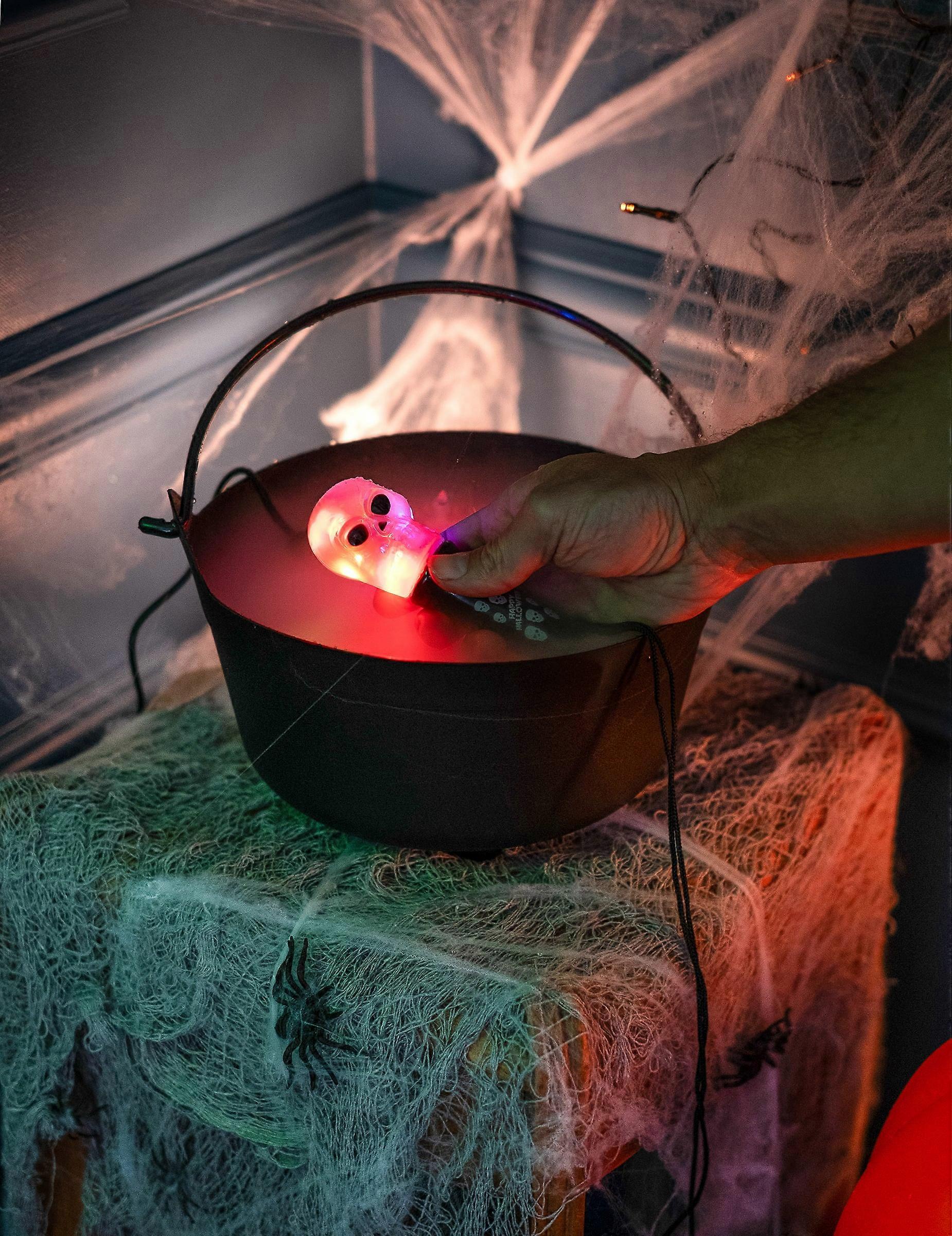 Skull light spinner torch