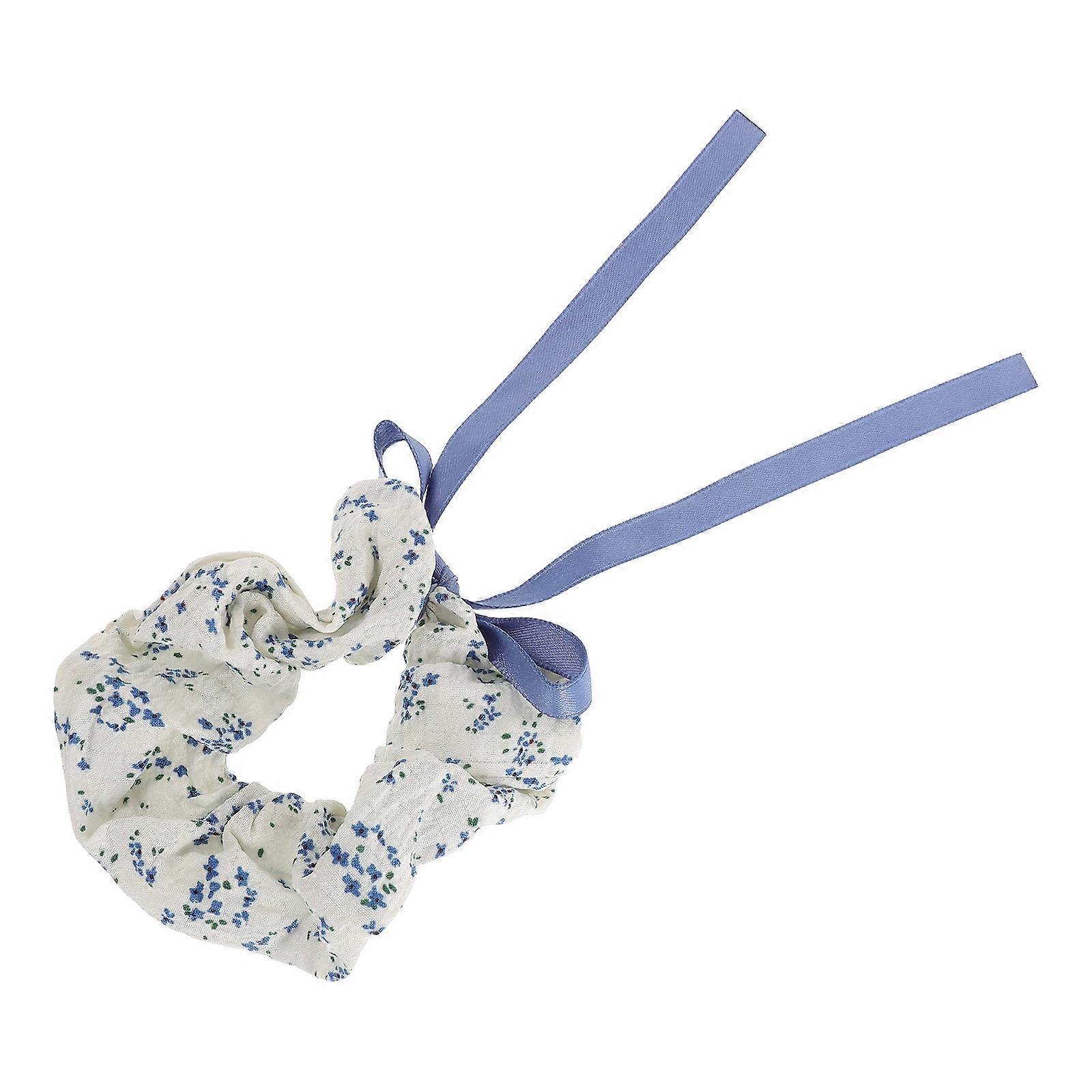 Chouchous élégants à fleurs pour porter des élastiques à cheveux