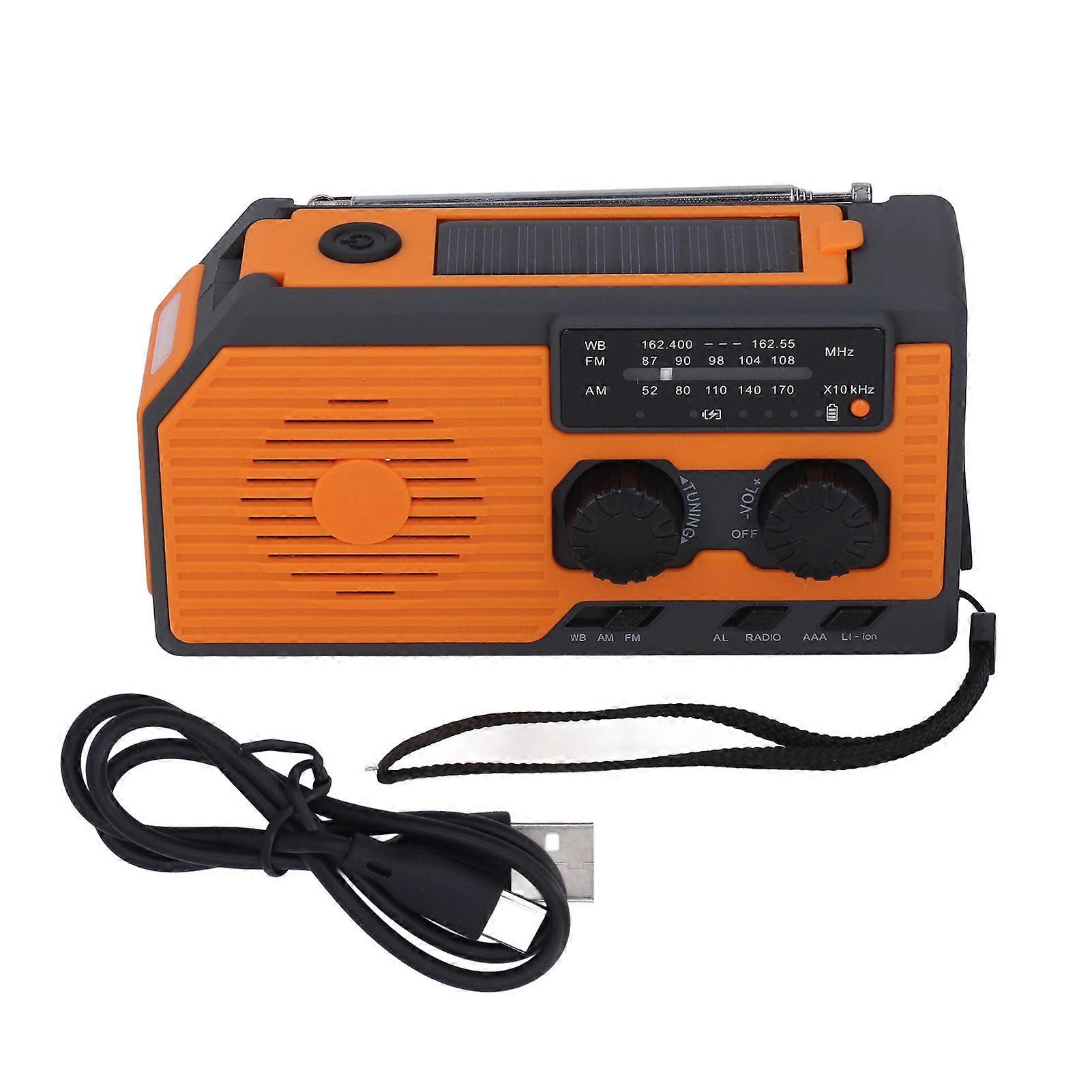 Caricabatterie di emergenza ad energia solare Torcia elettrica a LED IPX3 Radio impermeabile con manovella 5000mah Batteria
