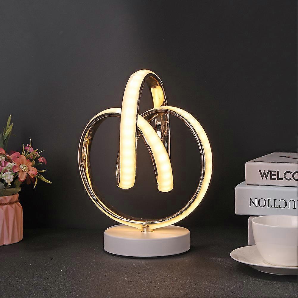 LED lamp in acrylic spiral shape, minimalist and modern design, ideal for an office, bedroom or living room, with US adapter