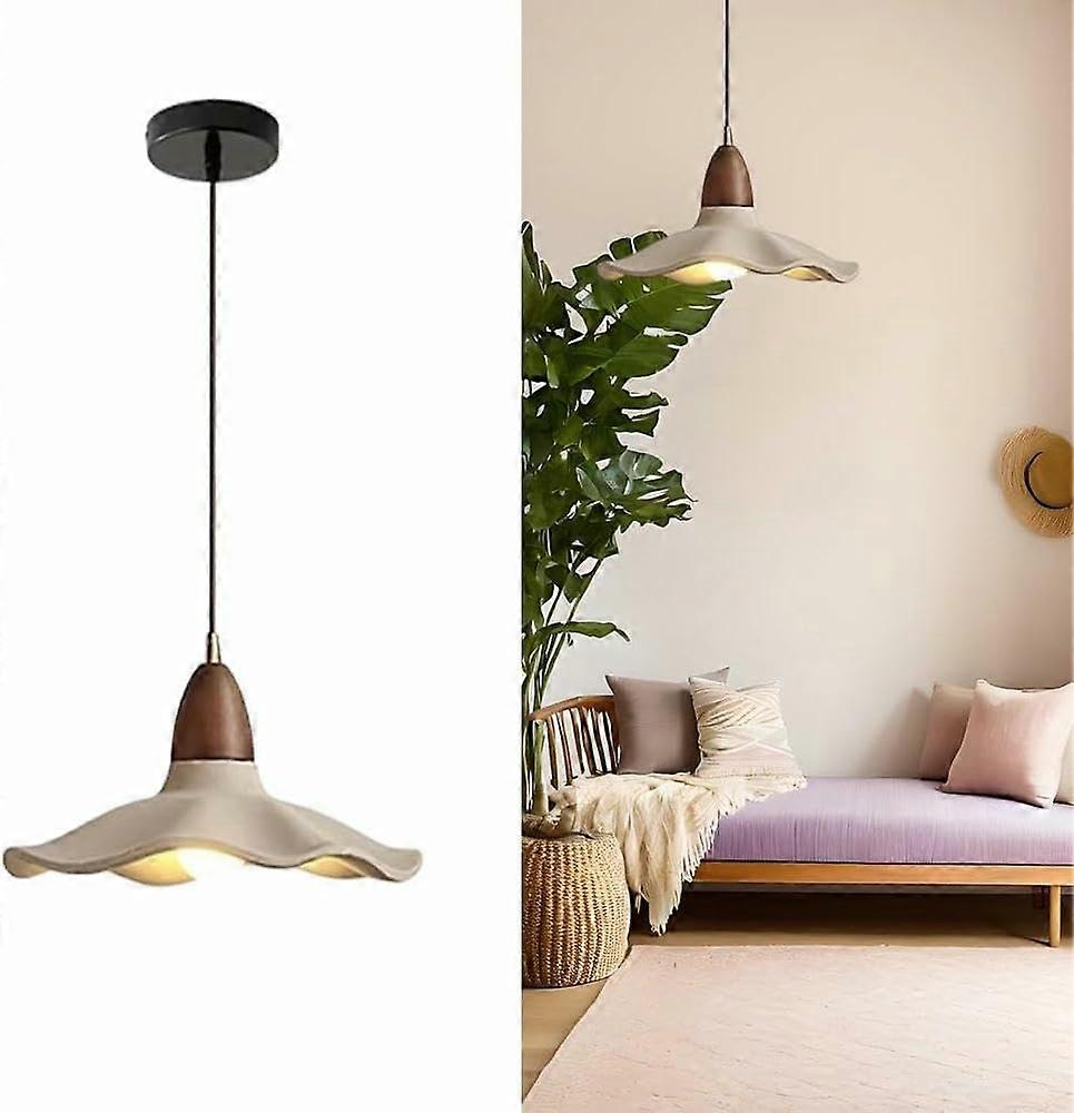 Modern Ceramic Wavy Pendant Light with Adjustable Height and Soft Ambient Lighting for Home Decor