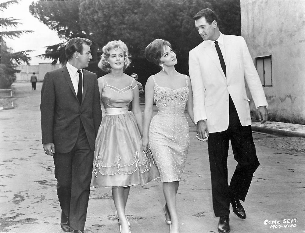 A scene from Come September Poster